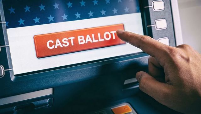 Finger Tapping Cast Ballot Button on Electronic Voting Kiosk with American Stars