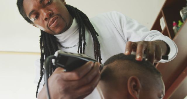 Professional Barber Trimming Client's Hair in Modern Barbershop - Download Free Stock Images Pikwizard.com