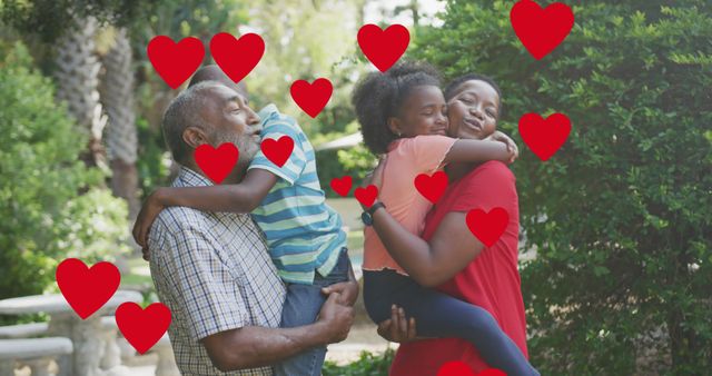 African American Family Hugging in Park Surrounded by Hearts - Download Free Stock Images Pikwizard.com