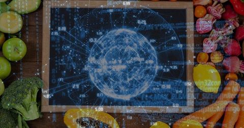 Kitchen counter projecting holographic data globe over produce mixing food and technology
