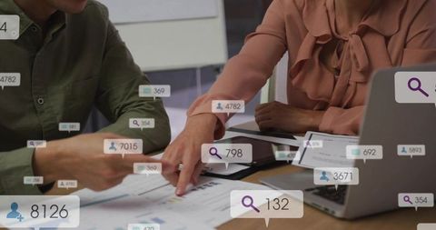 Reviewing charts and pointing at analytics dashboard with social engagement badges