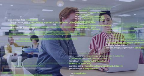 Developers Collaborating on Laptop with Code Overlay in Modern Open-Plan Office