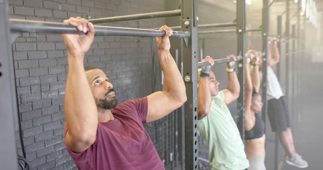 Diverse Group of People Doing Pull-Ups in Gym - Download Free Stock Images Pikwizard.com