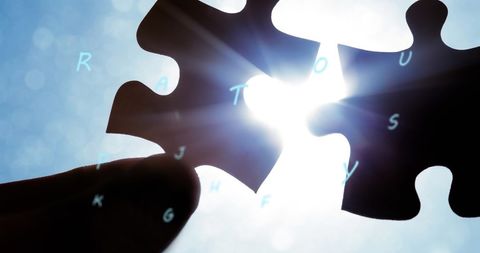 Puzzle Pieces Meeting Against Bright Sky Symbolizing Connection - Download Free Stock Images Pikwizard.com