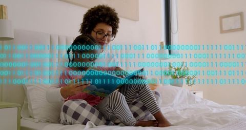 Mother Reading Digital Storybook with Child on Bed, Binary Code Overlay, Cozy Morning