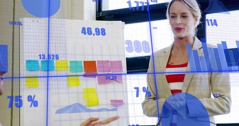 Woman presenting with flip chart and ar data overlays during collaborative business meeting