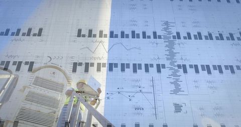 Inspecting Rooftop Worker Holding Plans on Stair Platform with Data and Chart Overlay