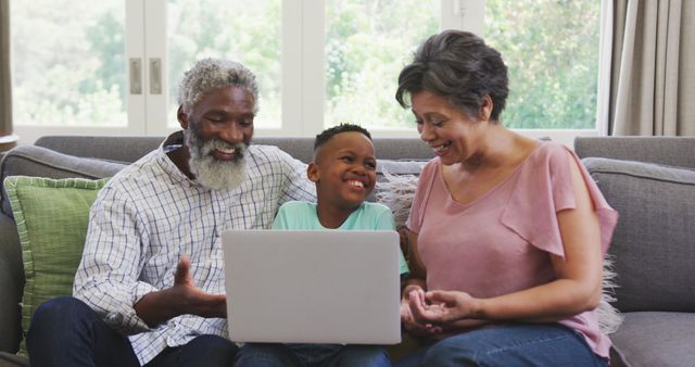 Happy Multigenerational Family Enjoying Video Call on Laptop at Home - Download Free Stock Images Pikwizard.com