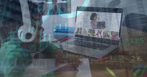 child engaged in online learning with financial tech overlay - Download Free Stock Images Pikwizard.com
