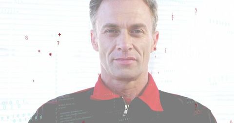 Mature professional gazing with binary overlay, backlit blinds, confident portrait