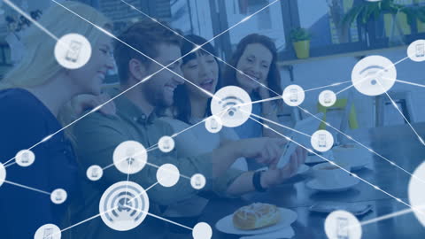 Colleagues Collaborating on Tablet with Digital Networking Overlay