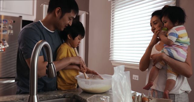 Family Cooking Together in Bright Kitchen - Download Free Stock Images Pikwizard.com