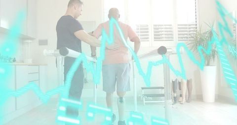 Therapist assisting man walking with prosthetic leg on parallel bars with ecg overlay