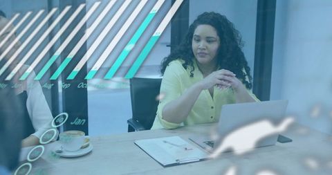Businesswoman Examining Digital Analytics in Modern Office Environment