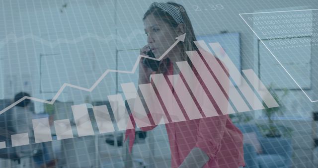 Businesswoman Discussing Financial Data on Phone in Modern Office - Download Free Stock Images Pikwizard.com