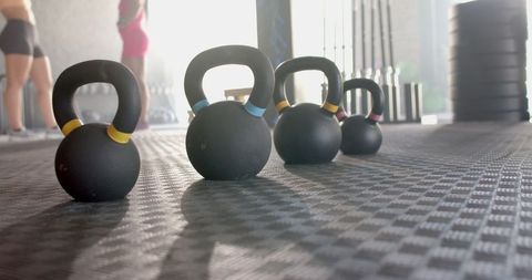 Kettlebells Aligned in Modern Gym for Intense Fitness Training