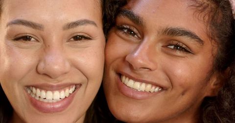 Diverse Female Friends Smiling Close Pose Portrait