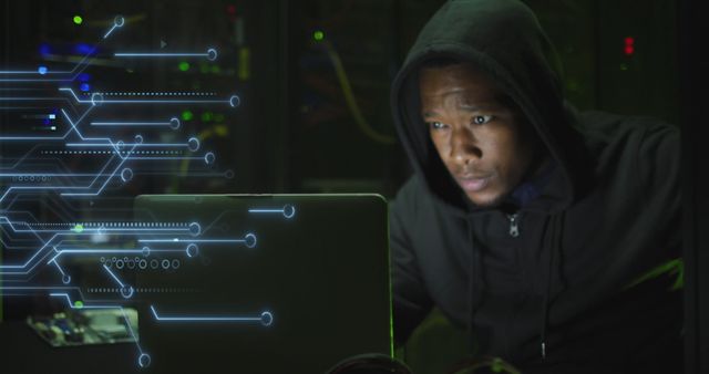 African American Hacker Focused on Computer with Digital Data Stream - Download Free Stock Images Pikwizard.com