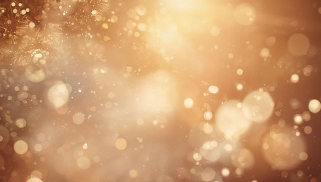 Shimmering golden bokeh lights sparkling with warm glitter and soft snowflake glow