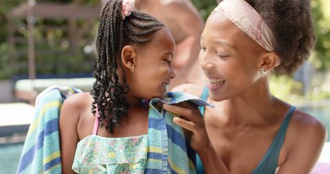Happy Mother and Daughter Enjoying Sunny Day by Pool - Download Free Stock Images Pikwizard.com
