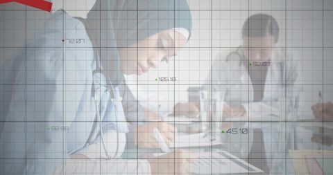 Muslim Medical Professional Analyzing Data in Office