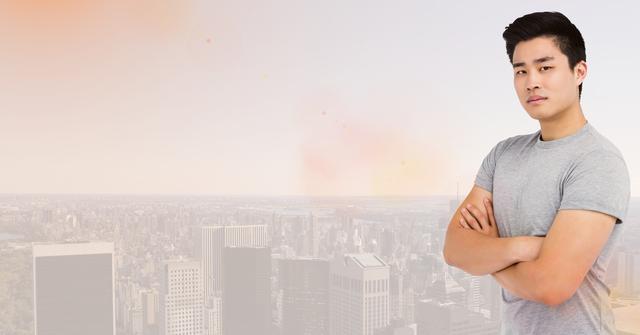 Young man stands confidently with arms crossed against a cityscape. Ideal for urban lifestyle promotions, career opportunities in big cities, young professionals, and city living themes.