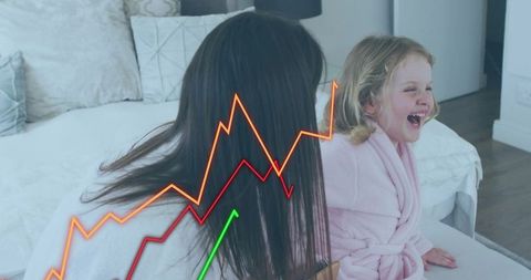 Mother and daughter laughing on bed wearing pink robe with playful line-graph overlay