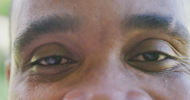 Close-Up of African American Man's Eyes Expressing Emotions - Download Free Stock Images Pikwizard.com