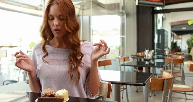 Young Redhead Woman Enjoying Cake in Cafe - Download Free Stock Images Pikwizard.com