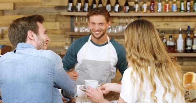 Barista Serving Drinks to Smiling Friends at Cozy Cafe - Download Free Stock Images Pikwizard.com