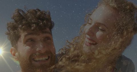 Smiling Couple Embracing Nature Romance Under Vibrant Sun