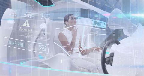 Woman in self-driving car with futuristic digital interface overlay