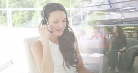 Businesswoman on Call with Cityscape Overlay for Global Connection Concept