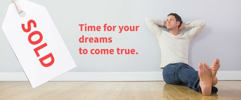 Relaxed man with sold tag inspiring real estate success