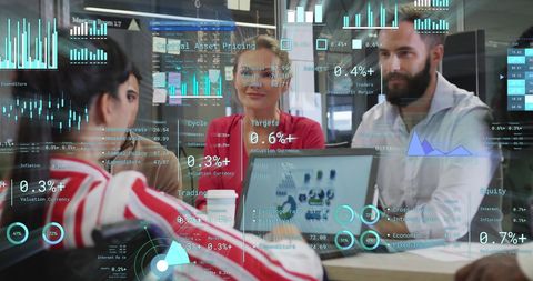 Business Team Collaborating with Financial Data Screens Overlay