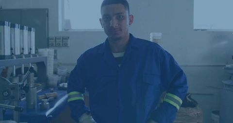 Determined hispanic engineer stepping up at a precision engineering workshop