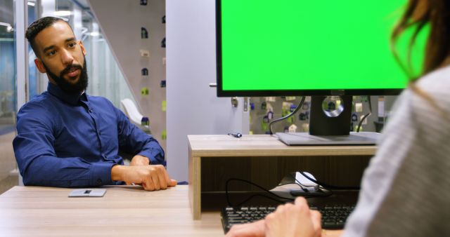 Professional Business Meeting with Green Screen Monitor in Modern Office - Download Free Stock Images Pikwizard.com