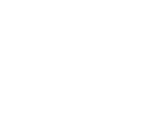 Silhouetted male footballer executing kick transparent background