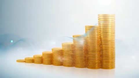 Rising Gold Coin Stacks with Waveform Illustrating Financial Prosperity
