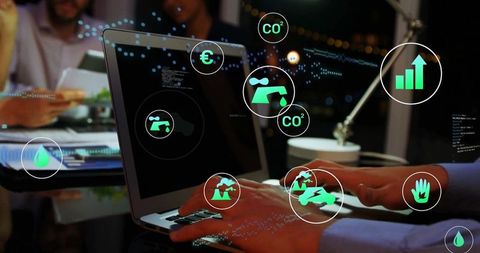 Business Collaboration with Eco-Friendly Technology Icons Overlay