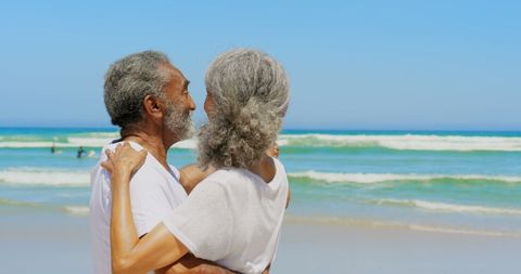 Happy Senior Couple Dancing Joyfully on Sunny Beach - Download Free Stock Images Pikwizard.com