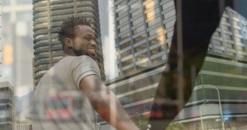 Joyful African American Couple Walking Amid Busy Urban Reflection