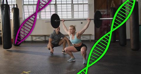 Female olympic-style weightlifter performing overhead squat with coach and dna helix overlay