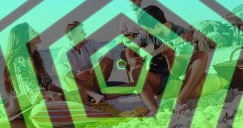 Friends Enjoying Music and Conversation at Beach