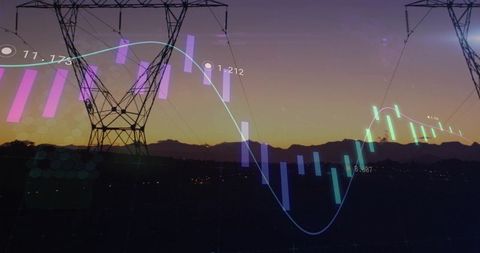 Overlaying energy analytics on transmission tower silhouette during sunset skyline