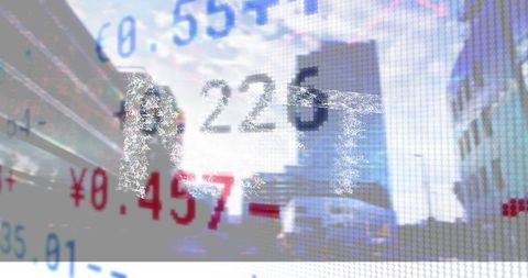 Digital Data Overlay on Cityscape Depicting Global Economic Trends