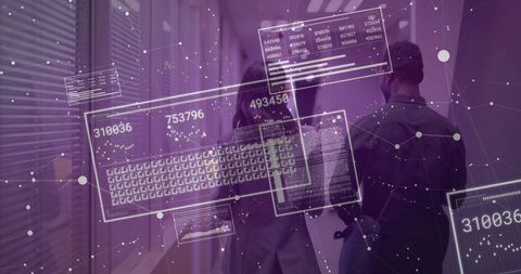 Business professionals walking through office corridor viewing augmented data HUD overlay