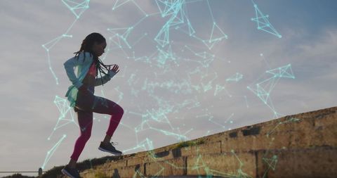 Woman jogging with digital overlay along promenade