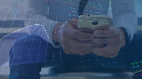 Businessman Analyzing Stock Market through Digital Graphs