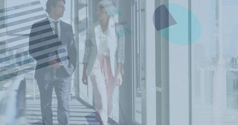 Business Professionals Discussing Financial Strategy Amid Virtual Charts